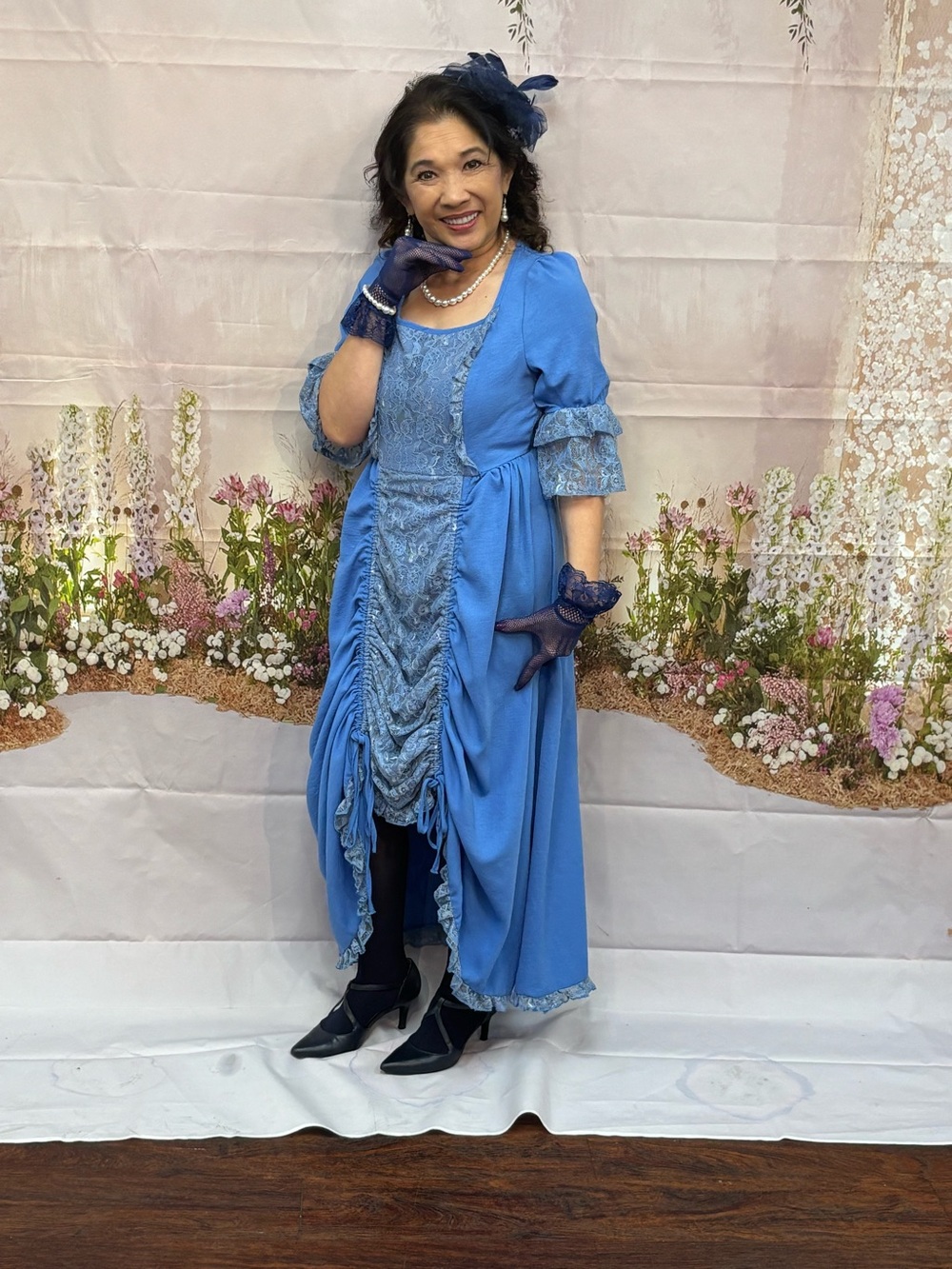 Blue Vintage-Style Lace & Ruching Dress with gloves, hat, necklace & earrings.
